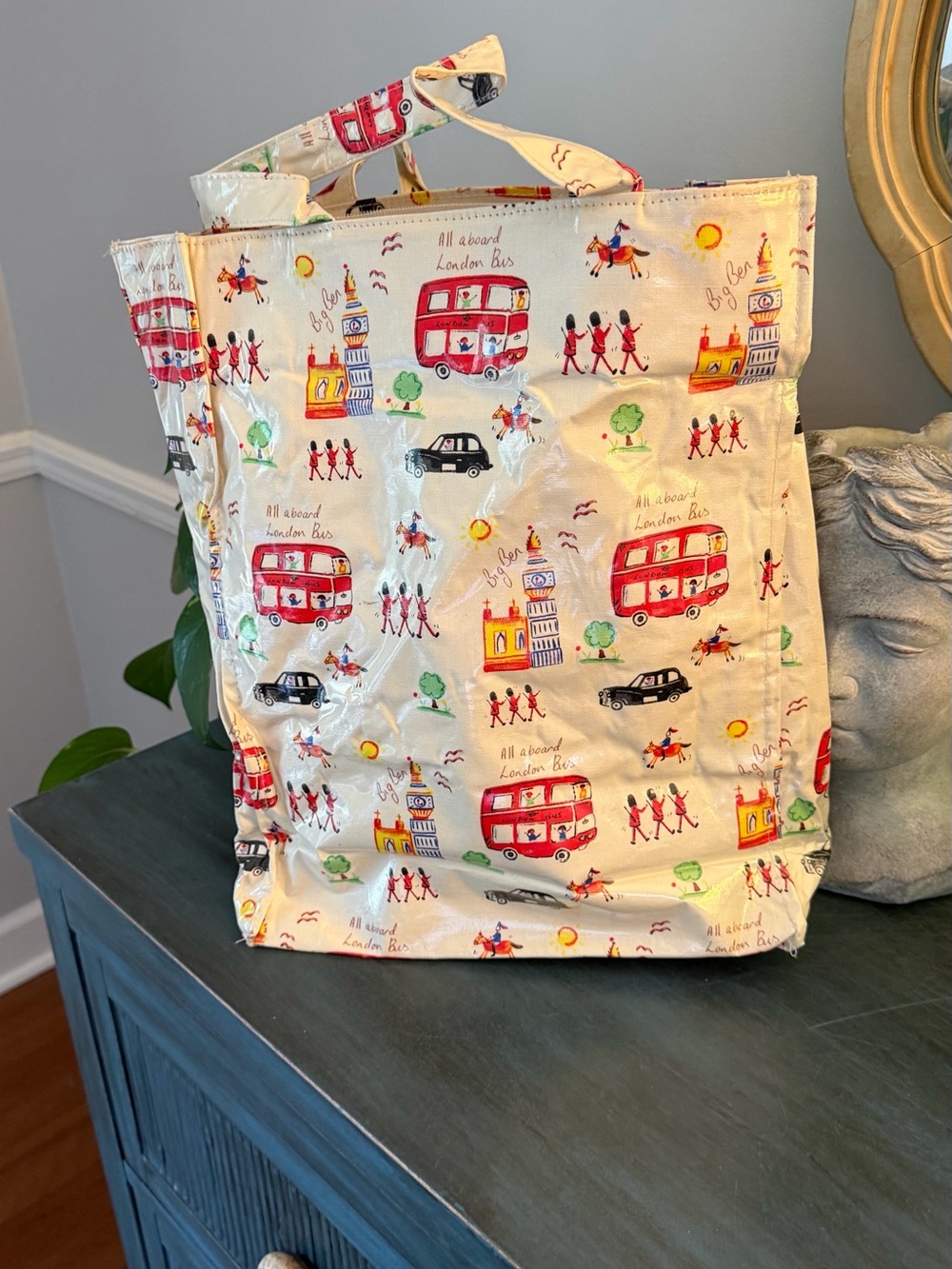 James Sadler oilcloth tote bag features a whimsical London-